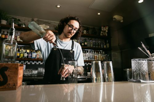 Making a cocktail at Clever Koi