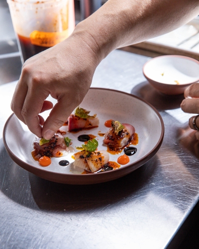 Plating Hamachi Crudo Arboleda at Arboleda in Scottsdale Quarter