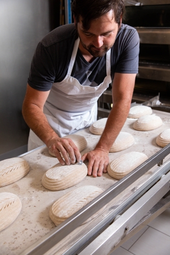 Proof Bread Owner Jon Prepping Sourdough Loaves at Proof Bread in Mesa AZ