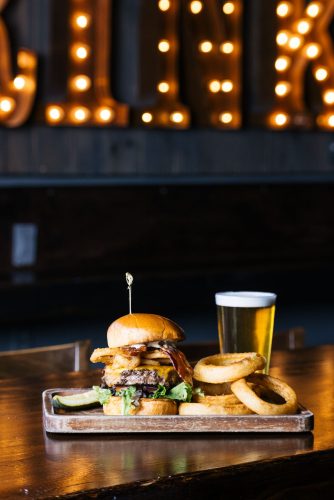 burger and onion rings at saddle mountain brewing company 2