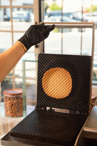 making cones at allora gelato