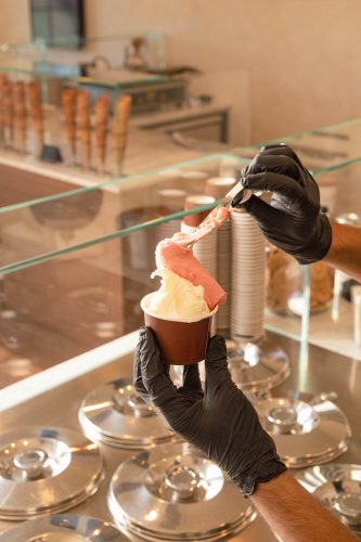 scooping gelato at allora gelato