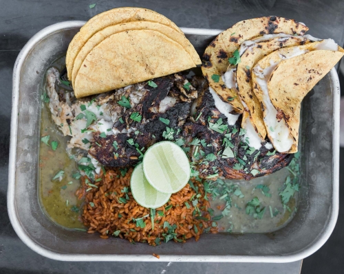 whole Grilled Red Snapper Served with Rice and Tortillas at Espiritu in Mesa AZ